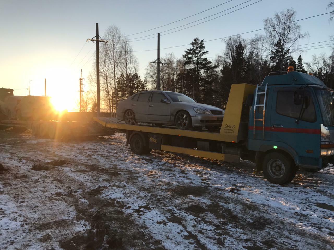 Фото перевозки авто на эвакуаторе